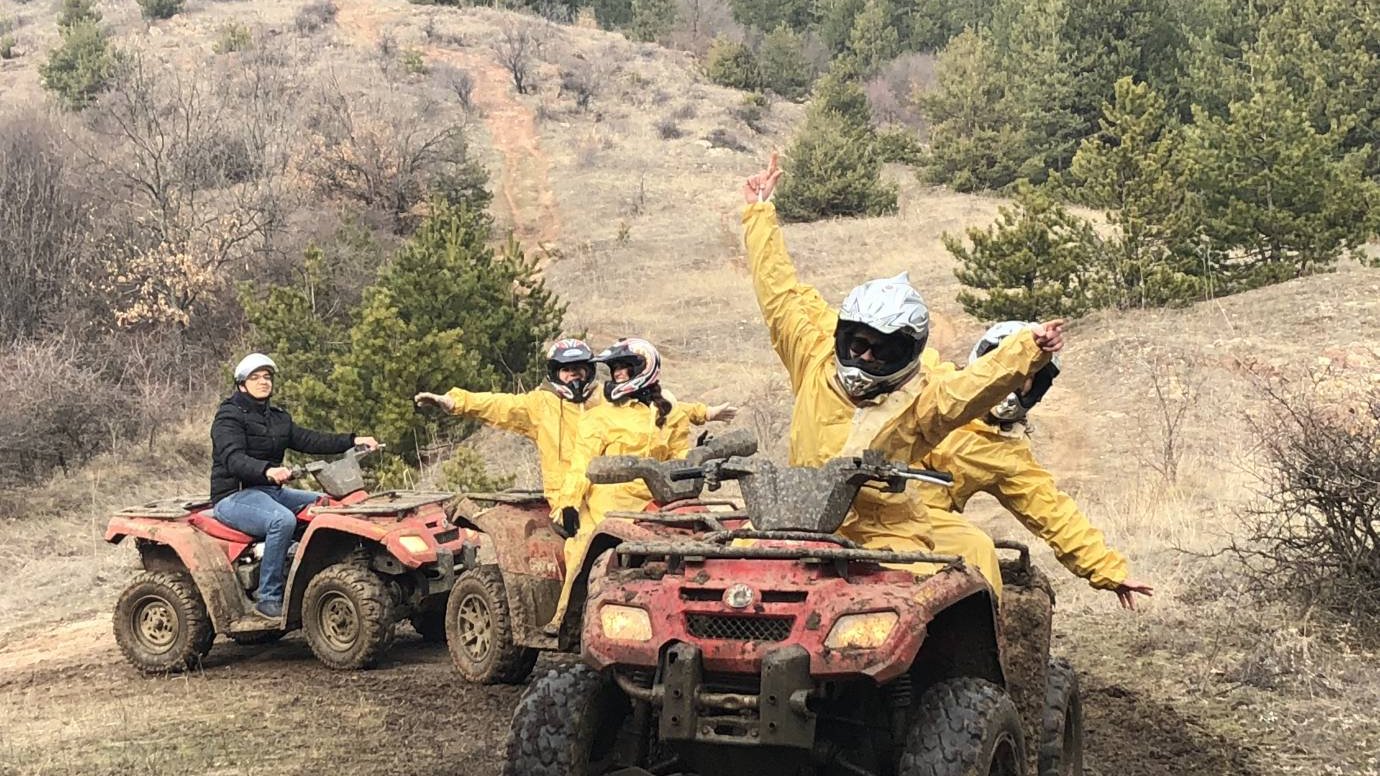 Can-Am ATV quad bike on a muddy mountain trail near Sofia