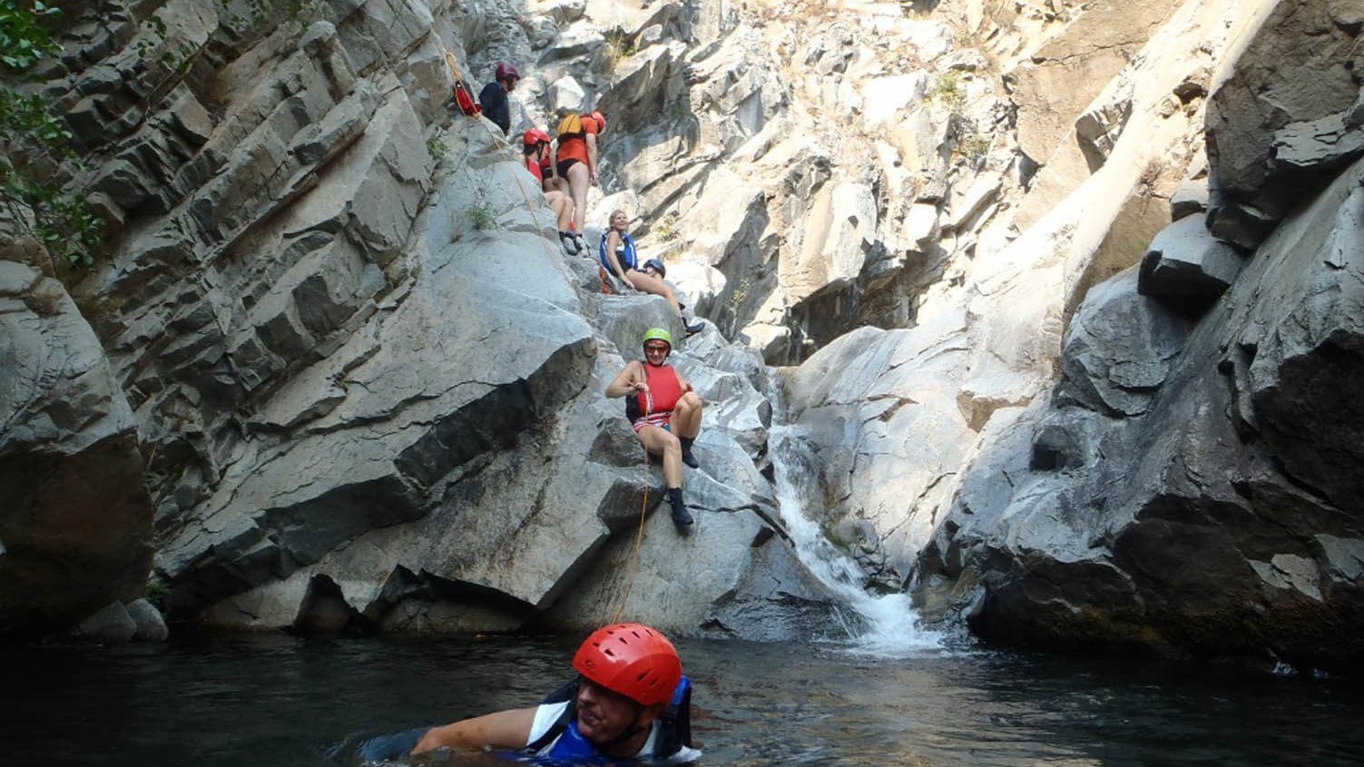 Canyoning through natural rock pools on the Vlahi River near Sofia