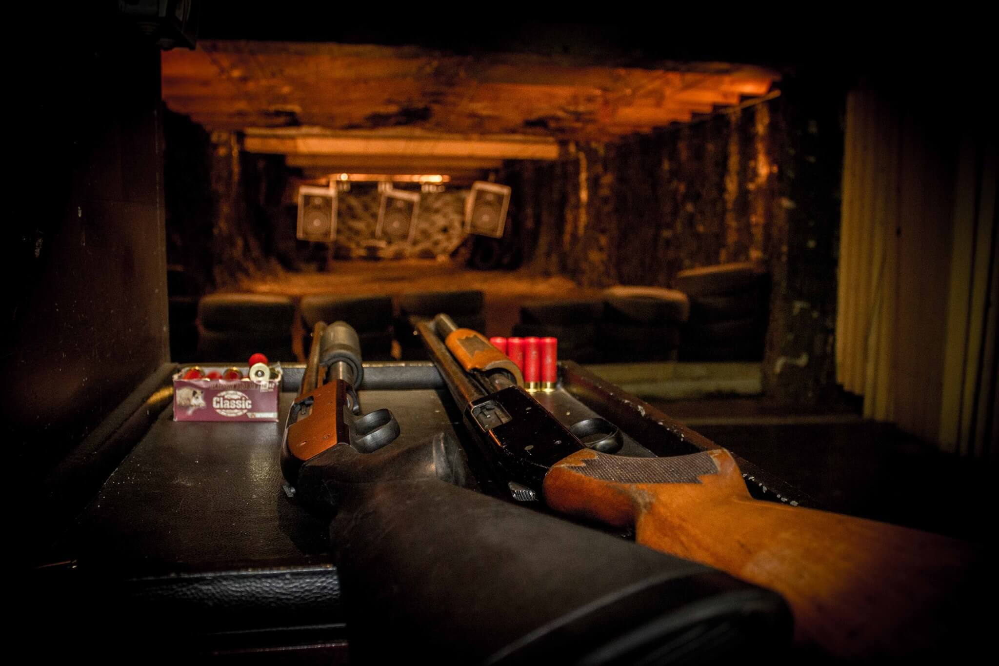 Pump-action shotguns and shells at the indoor range in Sofia