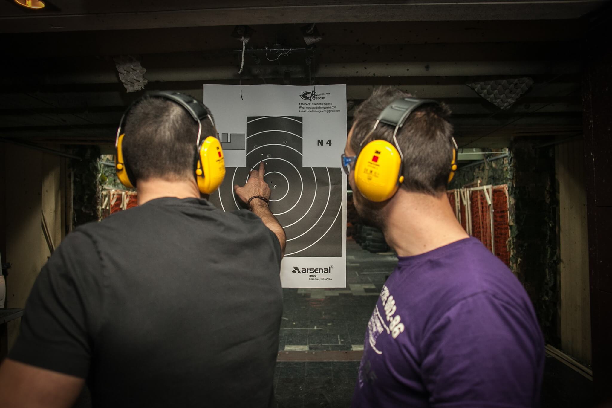 Instructor and shooter at Gerena indoor shooting range, Sofia