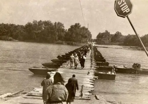 Archive photo of people crossing the pontoon bridge to the island