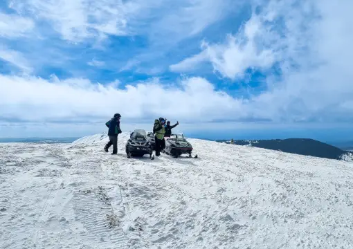 Riders stopping on the ridge of Stara Planina above the clouds
