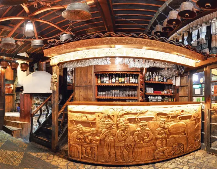 The carved wooden bar