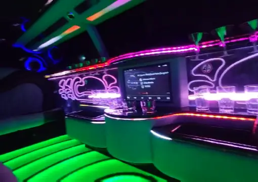 Party limo with green LED floor and bar lights