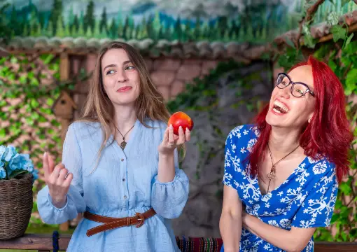 Two players with the golden apple in the Bulgarian village house escape room