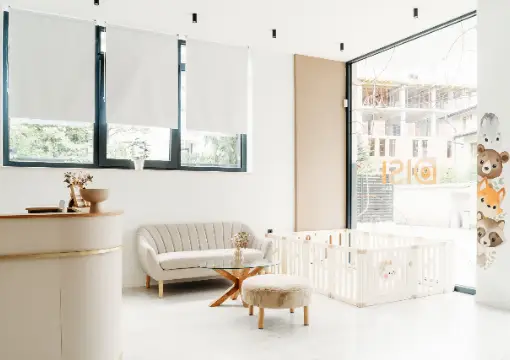 Waiting area with a sofa and a play corner for children