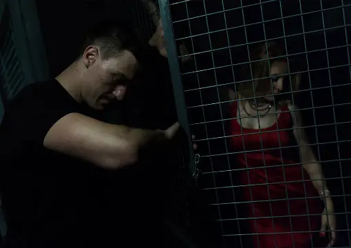 Two players behind a grid in the Matrix escape room