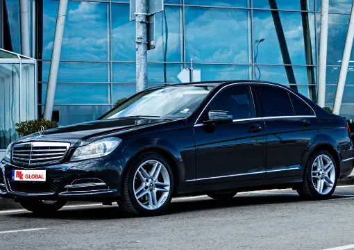 Black Mercedes C-Class sedan for up to 4 passengers