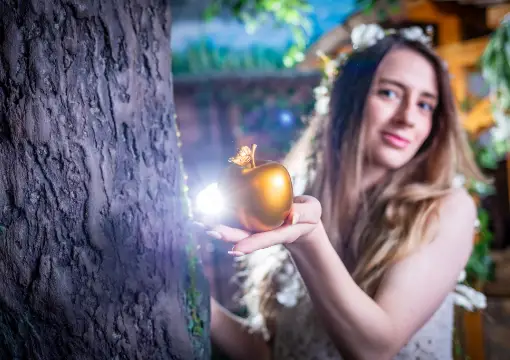 Girl with the golden apple in the fairy tale escape room in Sofia