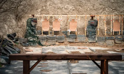 Weapons lined up at the outdoor range