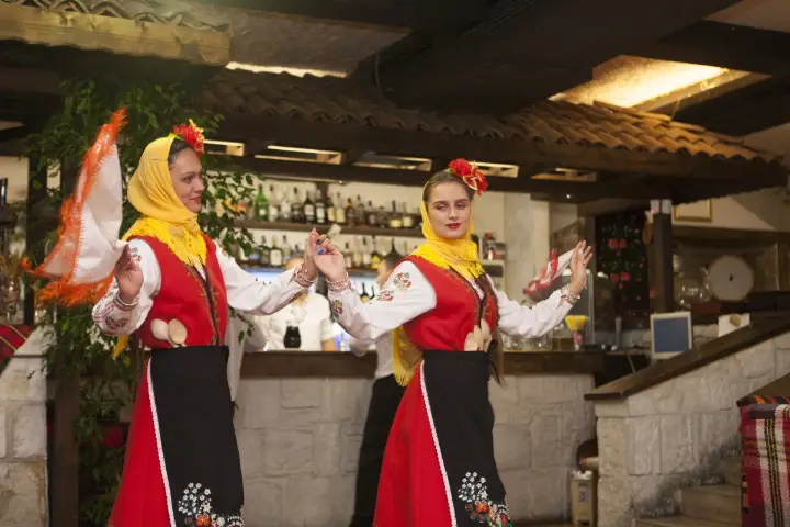 Folk dancers in regional costumes at Chevermeto