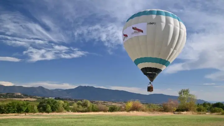 White balloon with mountains behind, near Sofia