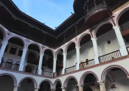 Striped arcades around the Rila Monastery courtyard