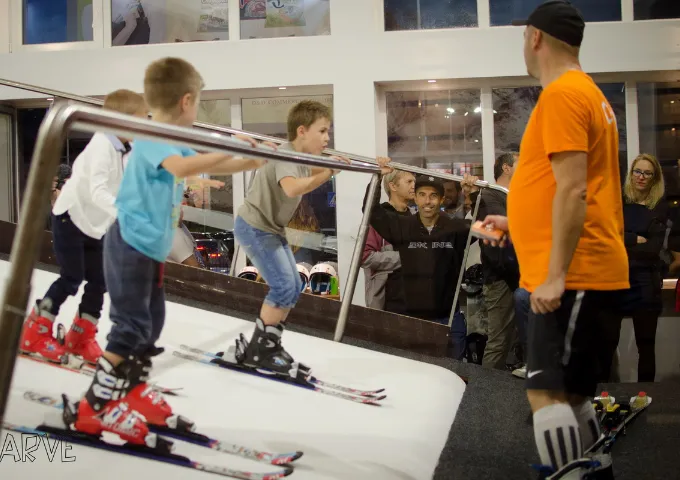 Children in a ski lesson with an instructor at CARVE indoor ski centre in Sofia