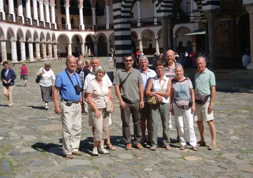 Travellers in the Rila Monastery courtyard