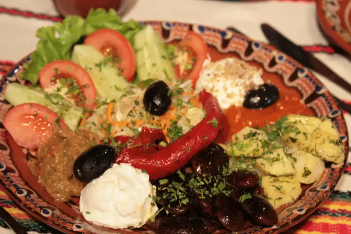 A Bulgarian salad with white cheese and olives