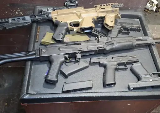 Kalashnikov, carbines and pistols on the firing bench