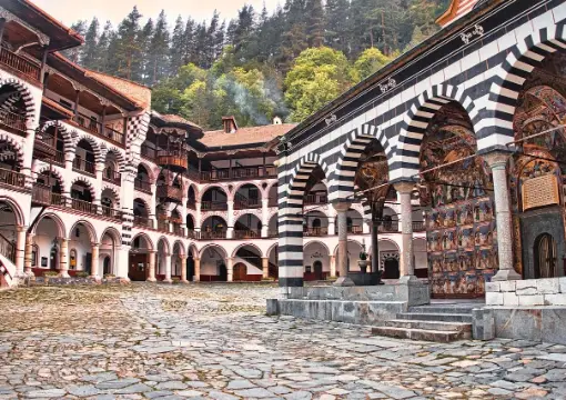 Striped arcades of the Rila Monastery courtyard