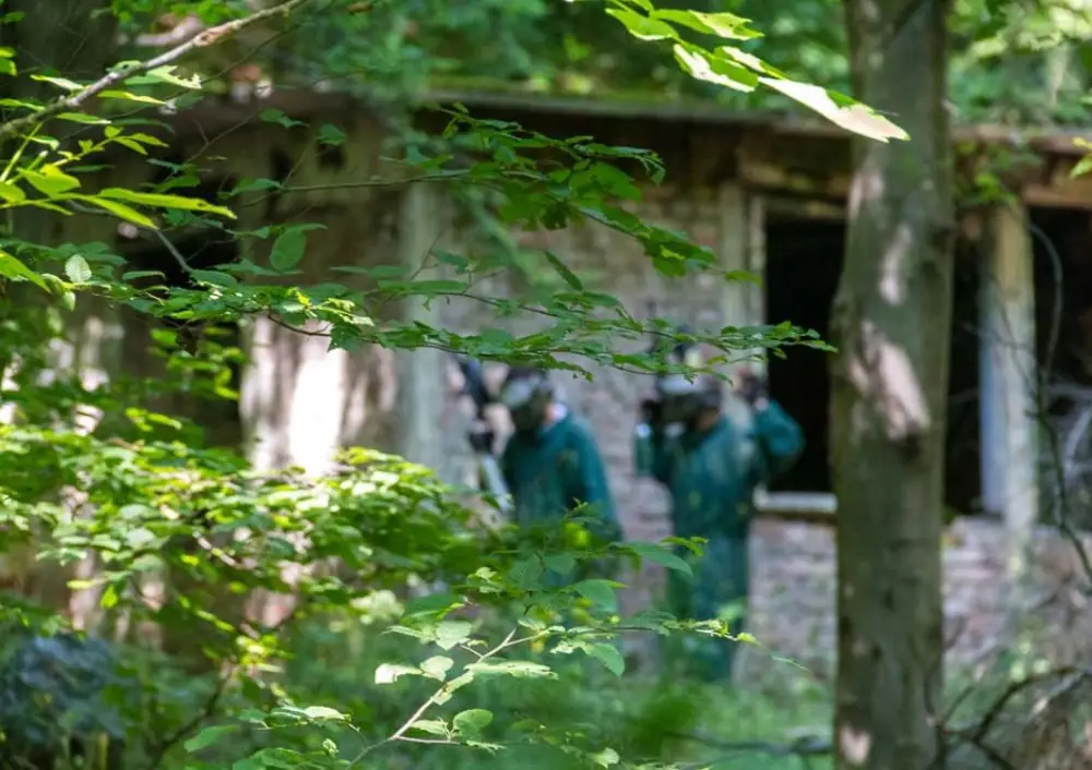 Two players by an abandoned building in the Vitosha forest