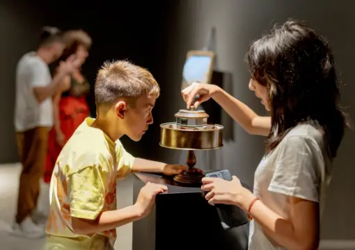 Family at an exhibit in the museum