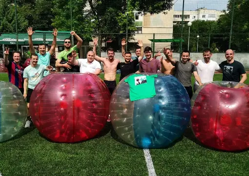 Team photo with red and blue bubbles after a game in Sofia