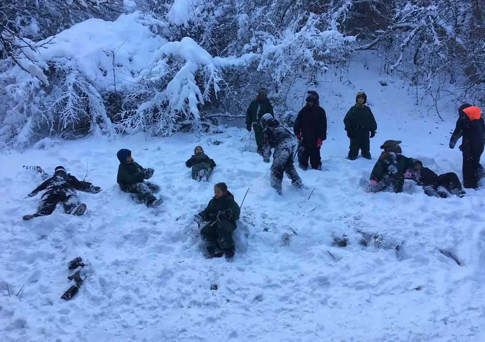 Winter paintball game in deep snow on Vitosha