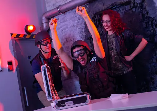 Team cheering after the bomb escape room game