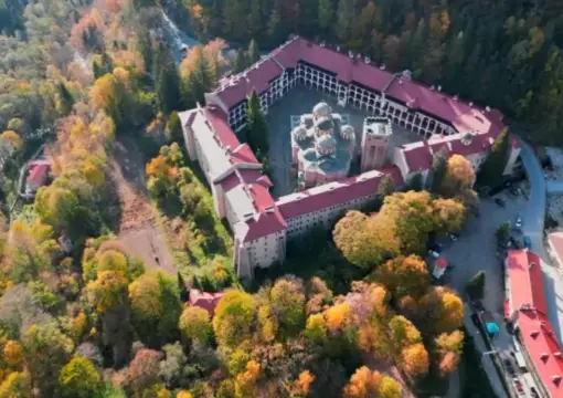 Rila Monastery from above with autumn forest