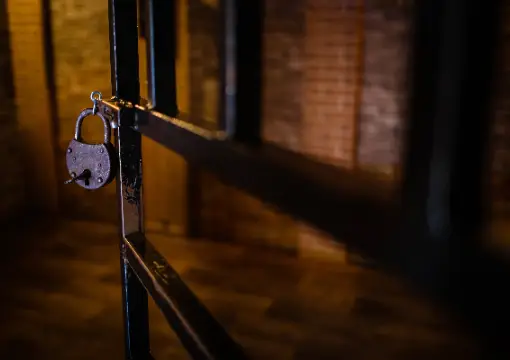 Padlock on a barred door in the Hour Escape room in Sofia